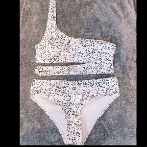 black and white dotted bathing suit.